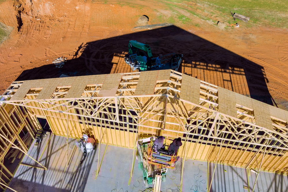 roofer-working-with-framing-installing-the-roof-tr-2024-07-25-18-33-31-utc